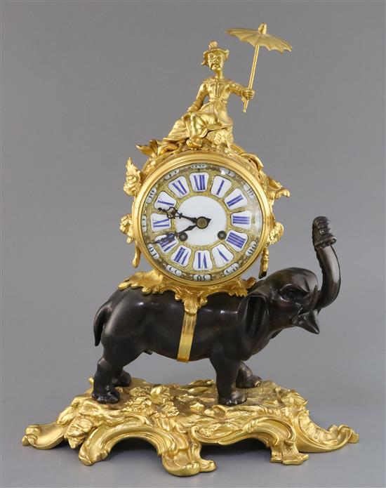 A late 19th century French bronze and ormolu mantel clock, height 17in.